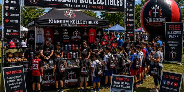 People gathered at Kingdom Kollectibles booth offering free blessing packs.