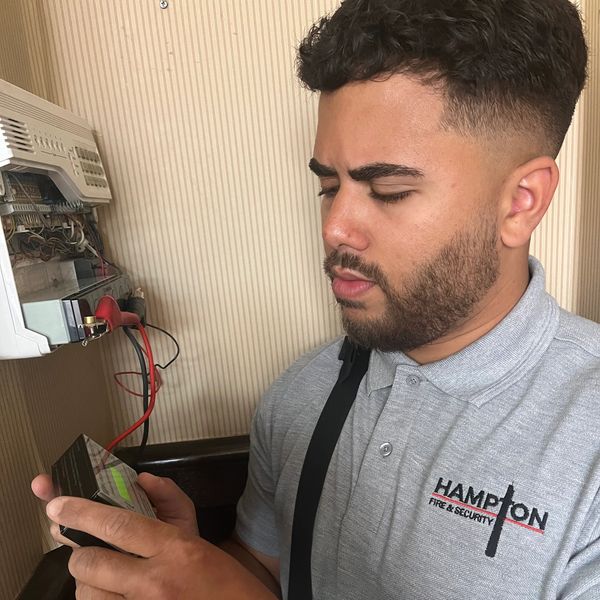 Hampton Security Engineer Testing Intruder Alarm System