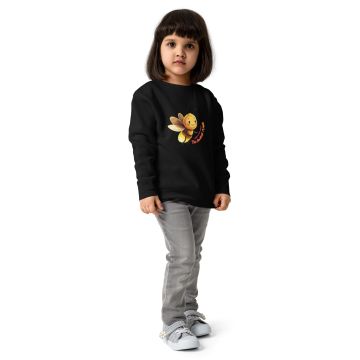 Young girl in a black sweatshirt with a bee design.