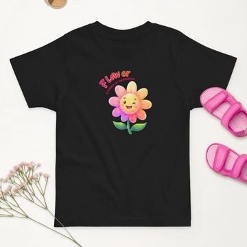 Black toddler t-shirt with a colorful winking flower and pink sandals.