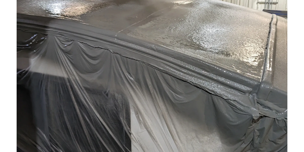 Spraying Flexarmor.