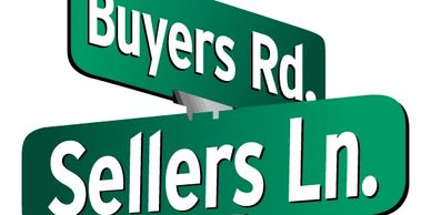 Street signs for Buyers Rd. and Sellers Ln.