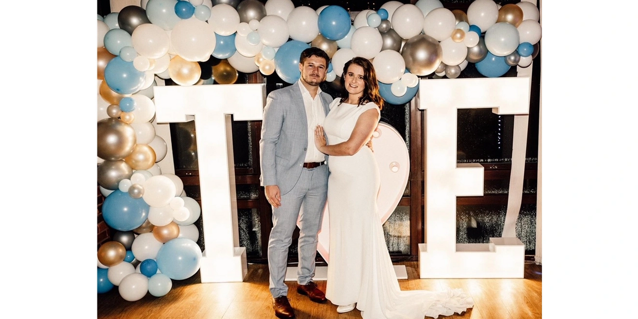 Organic Balloon Garland over Light Up Letters for  Wedding in Petersfield 