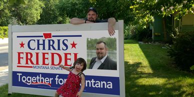 Volunteers setting up signs