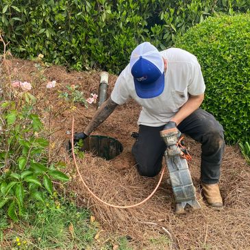 One Way Septic and Sons is Cameron a sewer line from the house to the septic tank