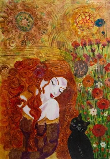 A woman with flowing red hair and a black cat among flowers.