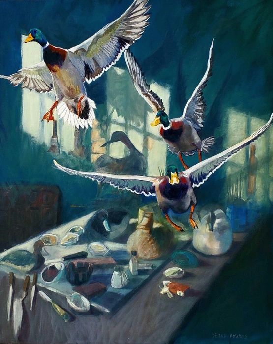 Painting of 3 mallard ducks flying off of an art table.