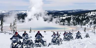 Corporate, luxury snowmobile tour charter with transportation logistics provided by Bing Mountain