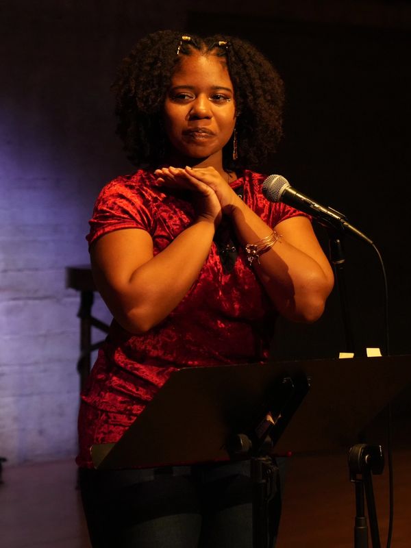 Aiyana Sha'niel at Little Black Poetry Book release event.
Photo courtesy of Jae.