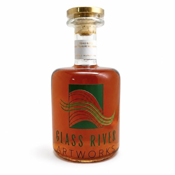 A bottle of Glass River Artworks bourbon with a gold cap.