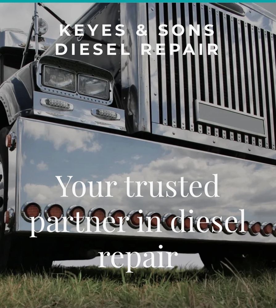 Close-up of a shiny diesel truck with Keyes & Sons Diesel Repair branding.