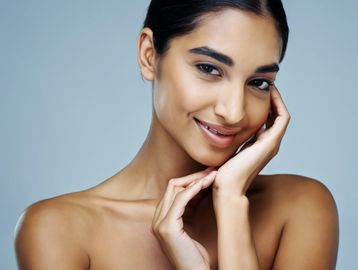 Beautiful middle eastern woman smiling showing her beautiful hands