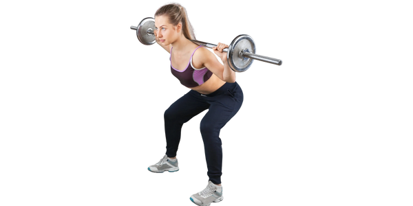 Woman performing barbell back squat for lower body strength at CICO Fitness and Wellness