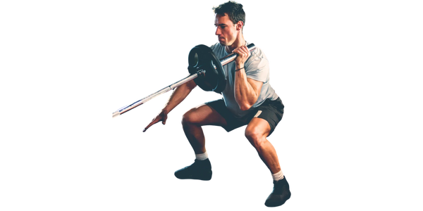 Man performing landmine squat for strength training at CICO Fitness and Wellness