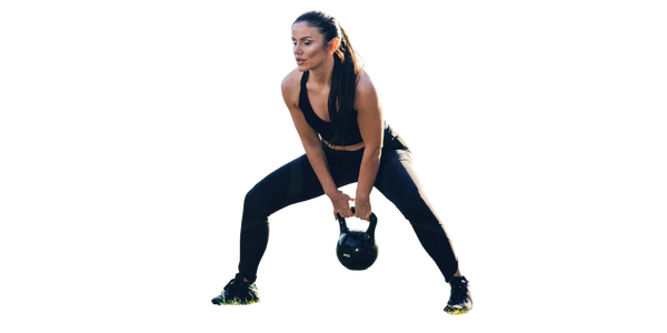 Woman performing kettlebell exercise for strength and fat loss at CICO Fitness and Wellness