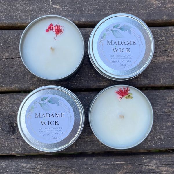 Silver travel tins filled with natural soy wax. 