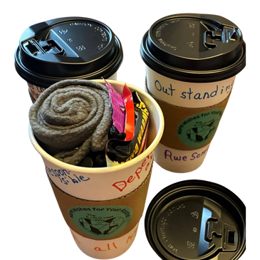 Three takeaway coffee cups, two with lids and one filled with various items.