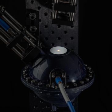 <img src=“Integrating_sphere.jpg" alt=“Measurement of sample with integrating sphere”>