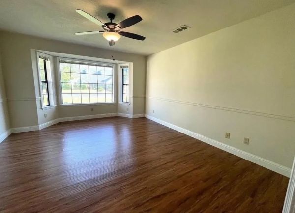 living room remodel, flooring removal, new install, painting, ceiling fan installation