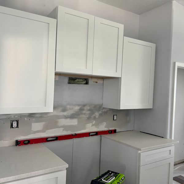 Kitchen remodel, kitchen cabinet replacement, removal of old backsplash, install new tile backsplash