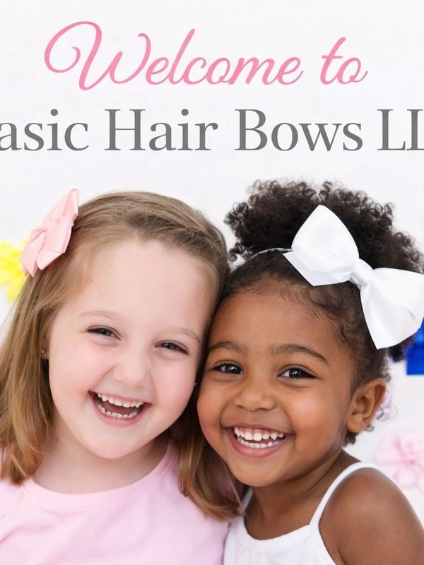 Two smiling girls wearing hair bows, showcasing joyful friendship.