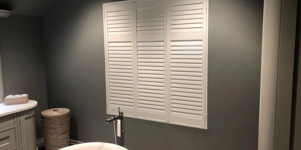 Full height, tier-on-tier bathroom shutters