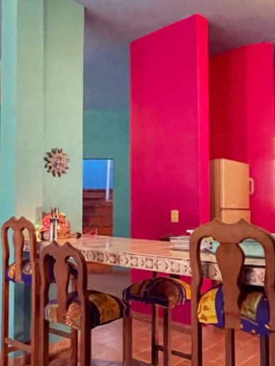 Playa Casa’s Magenta kitchen with beautiful vibrant colors  
Great room Turquoise 