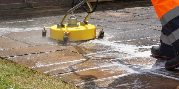 Flat Surface Cleaner, combined with a biotreatment to clean the surface using pressure washing