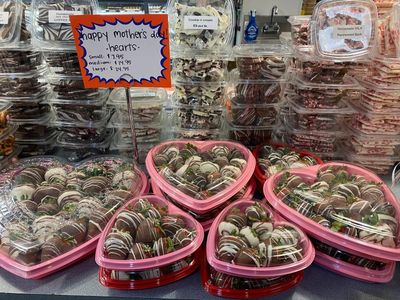 Heart-shaped chocolate boxes for Mother's Day on display.