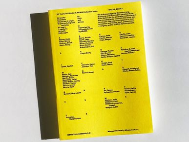 Yellow book back cover with text and credits.