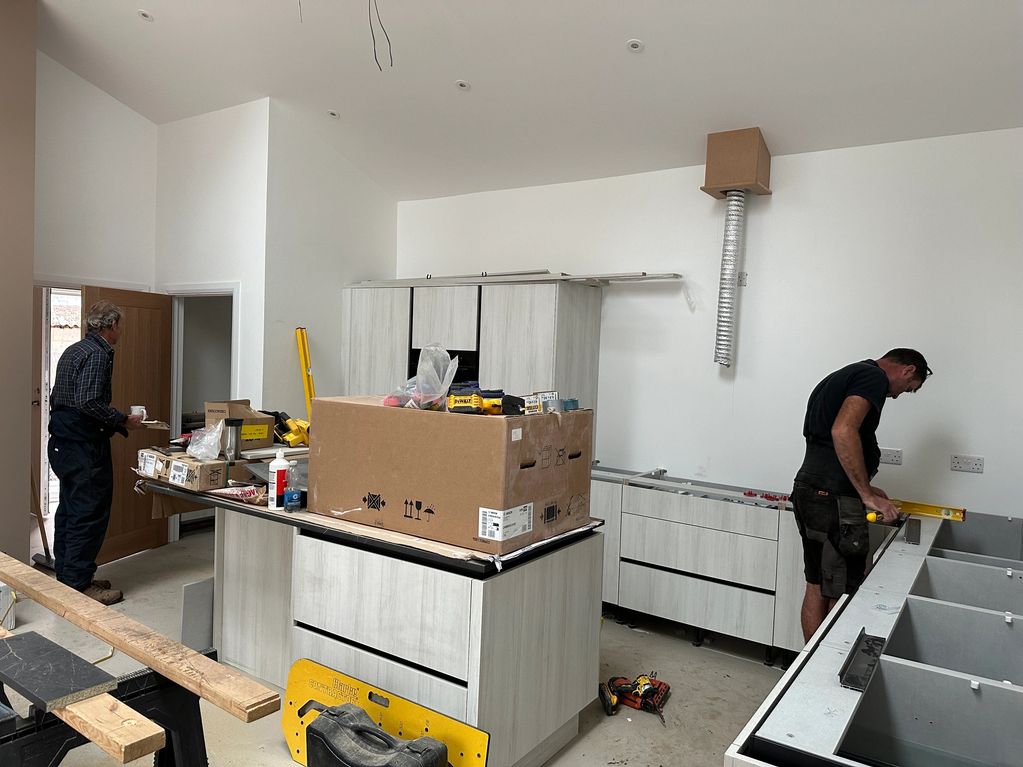 Kitchen being installed.