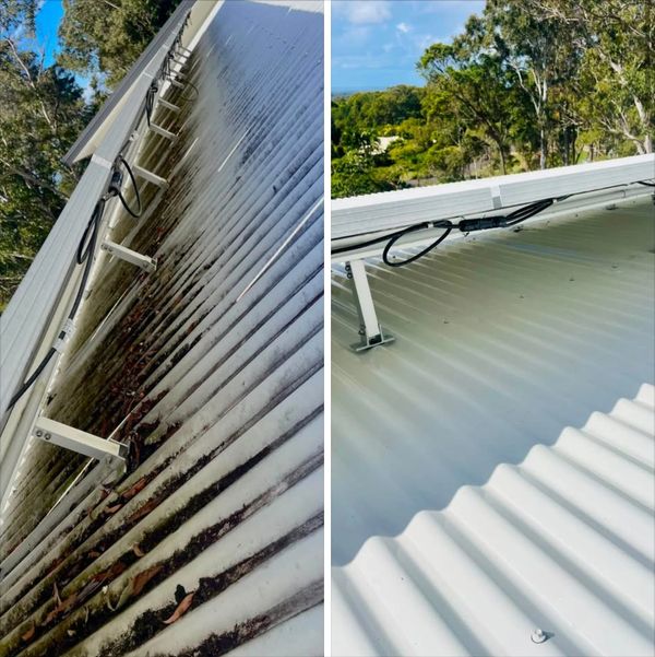Side-by-side comparison of a dirty and cleaned corrugated metal roof under solar panels.