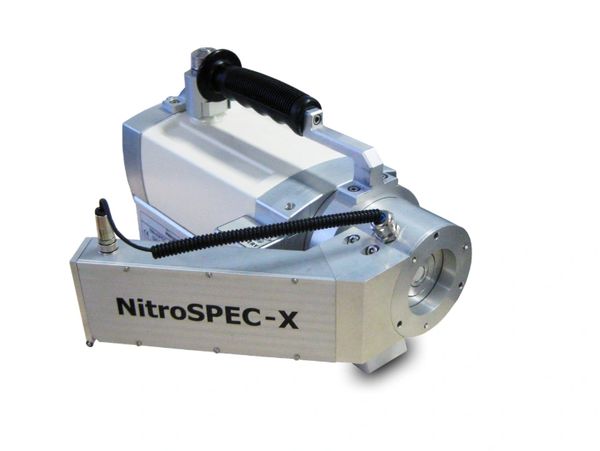 Portable device labeled NitroSPEC-X with handle and cable.