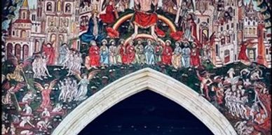 Medieval religious fresco depicting the Last Judgment above a church portal.