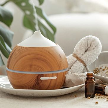 Difusor de aromas y frasco de aceites esenciales ASANA