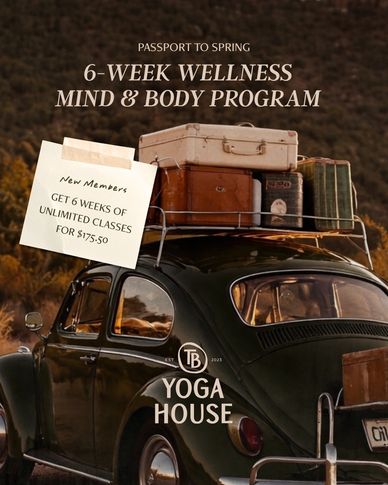 Vintage car packed with luggage promoting a 6-week wellness program at Yoga House.