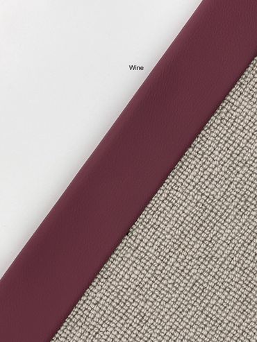 Close-up of three fabric swatches: white, wine red, and textured beige.