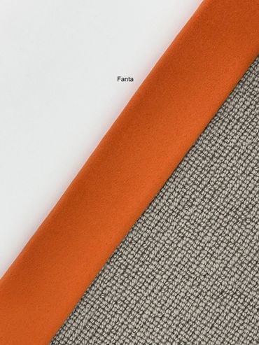 Three different textured surfaces with label 'Fanta' on the orange one.