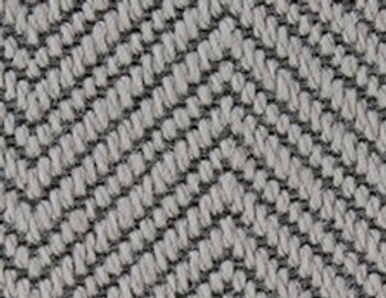 Close-up of gray herringbone fabric texture with diagonal weave pattern.