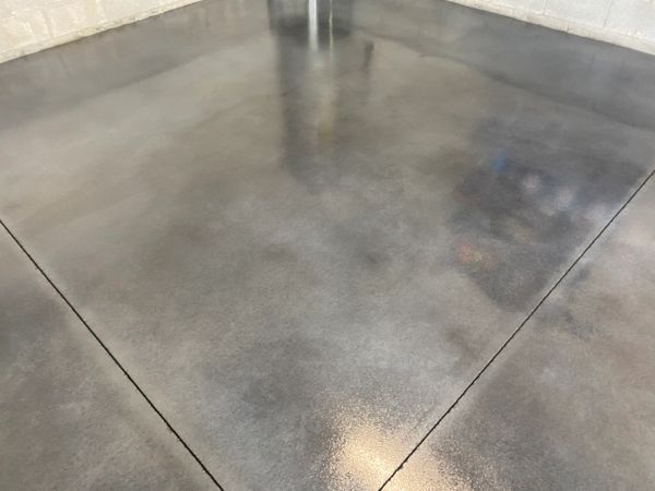Polished concrete floor with a glossy finish and clean lines.