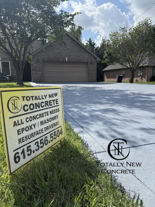 We extended the driveway and installed an overlayment over the old driveway, which was damaged so ba