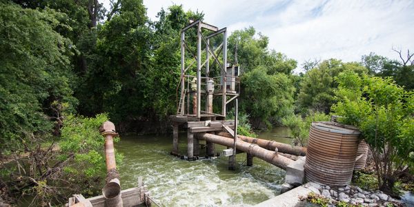 Wooden structure over flowing creek