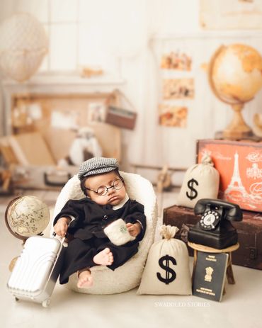 Newborn photography in a world travel theme