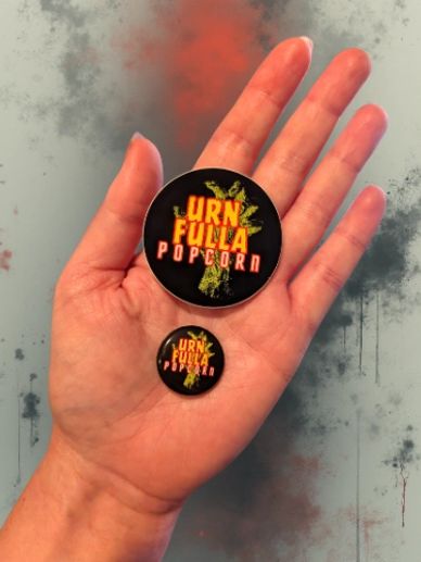 A pack of three 1" glow in the dark logo buttons and three 2" logo stickers!