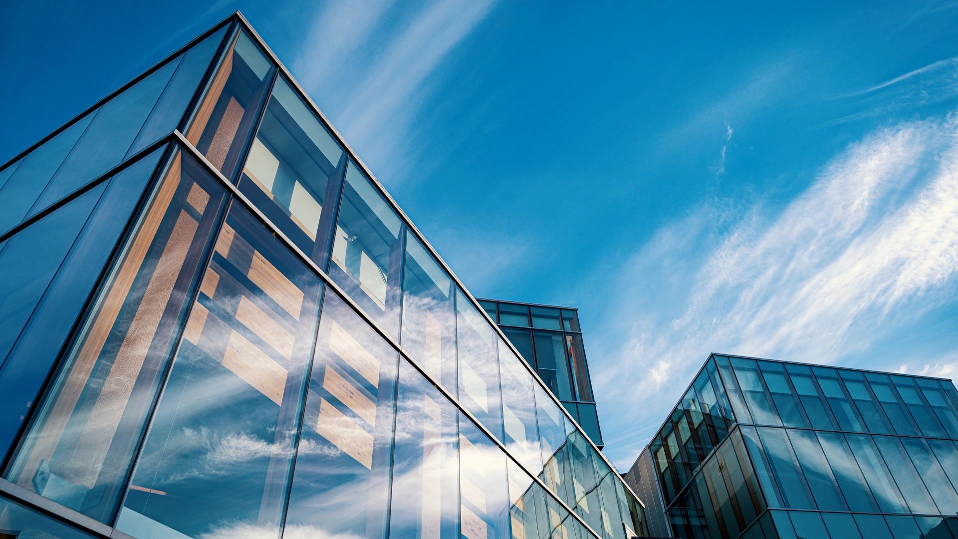 Office buildings filled with financial solutions with sky blue skyline in the background 