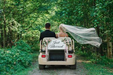 Just married on a forest path