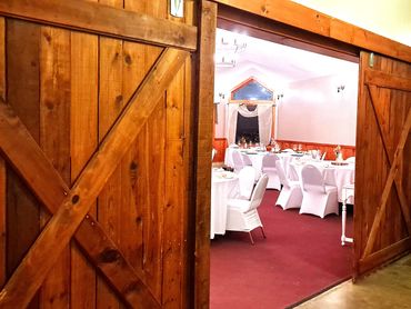 The rustic barn doors The Lodge at Wiscoy Lake
