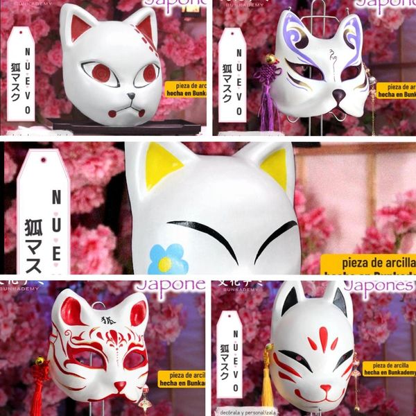 Various traditional Japanese fox masks with unique designs on display.
