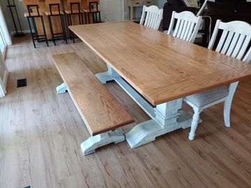 Farmhouse trestle table with whitewash base and white oak breadboard top and matching bench