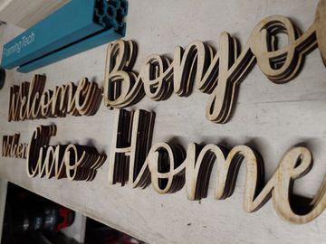 Laser cut words and lettering for signs